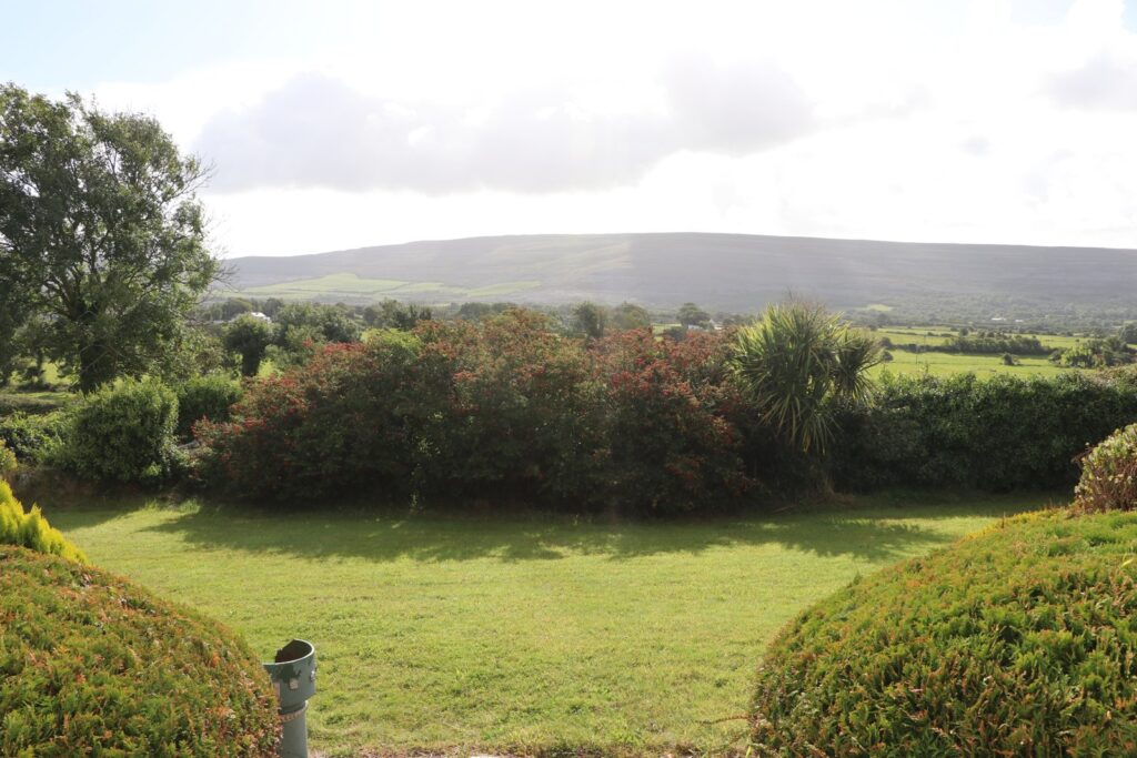 Garden and Burren landscape viewed from Newtown House